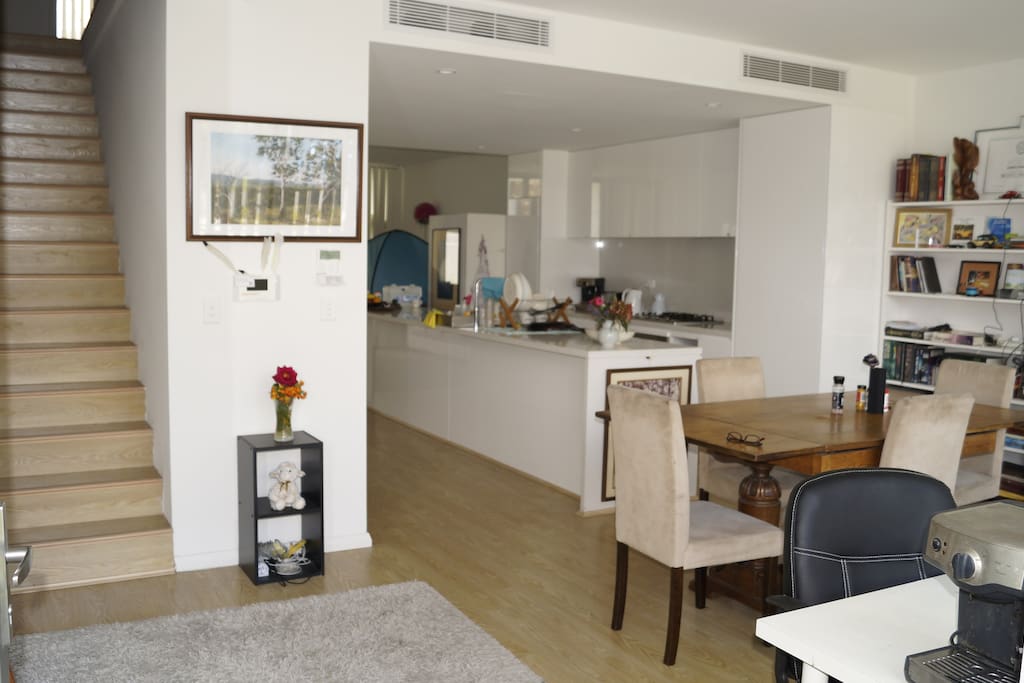 Entrance with dining and kitchen