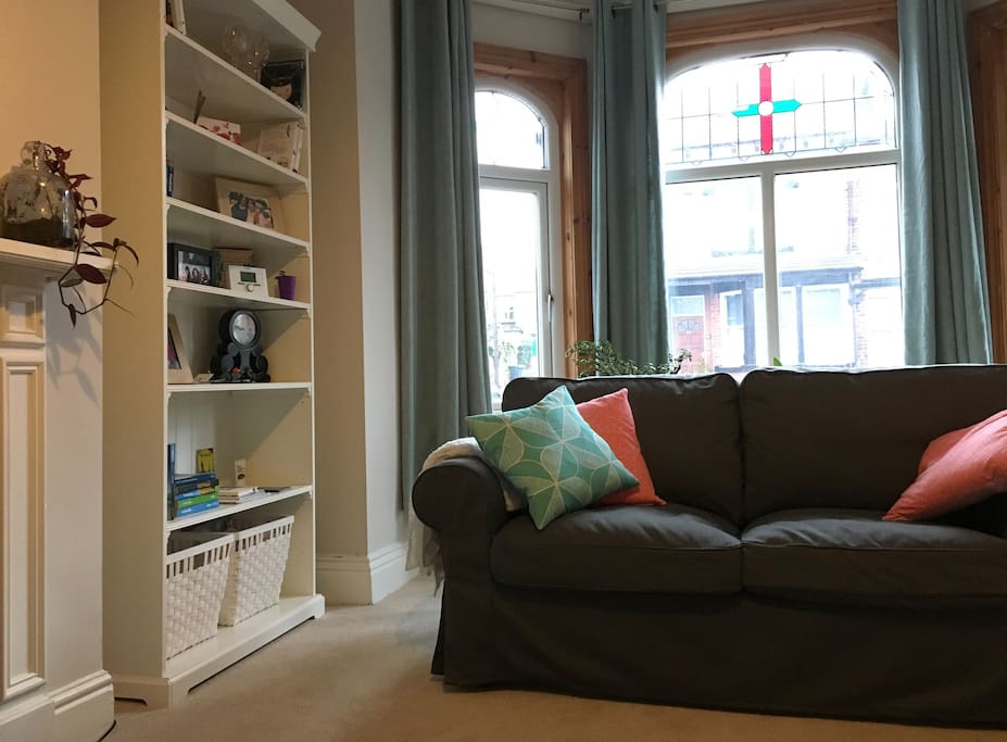 Traditional Yorkshire "back to back" terraced house. Living room with big bay window.