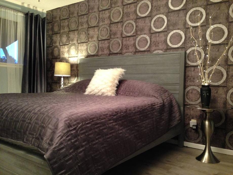 Master Bedroom.  We went with the popular in Europe dark scheme of colors and our guests love it! It's very relaxing and romantic at the same time.
The bed is a super comfortable Tempurpedic King bed. We get a lot of compliments on it!