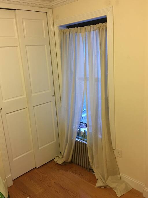 Quiet, terrace-facing window. Closet is empty for you to use!