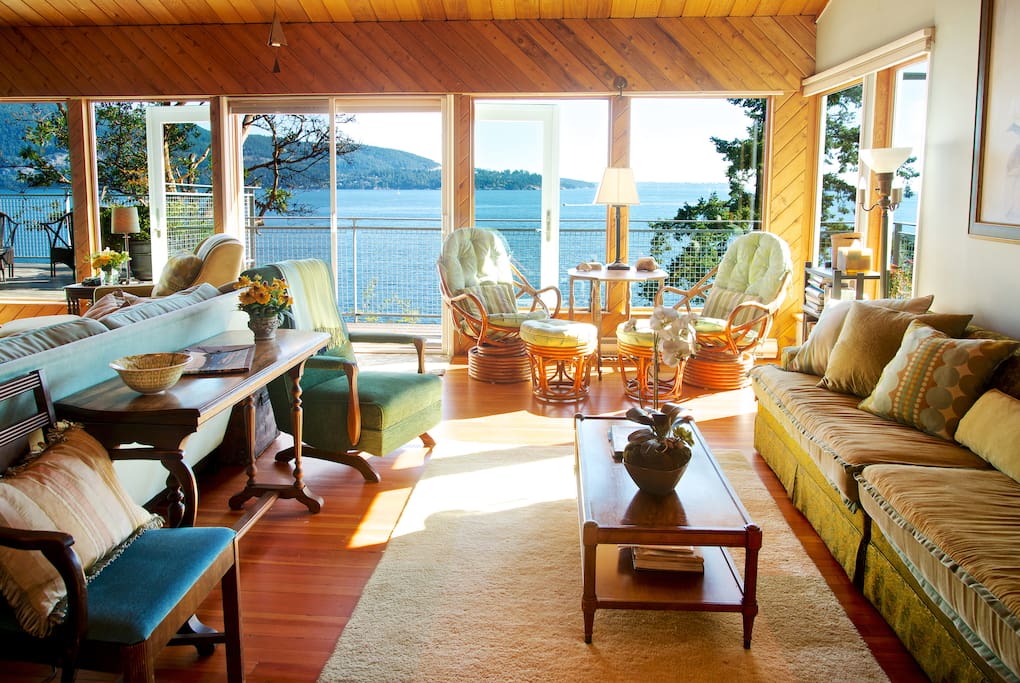 Sun drenched living room winter through summer all with spectacular southerly sea views.