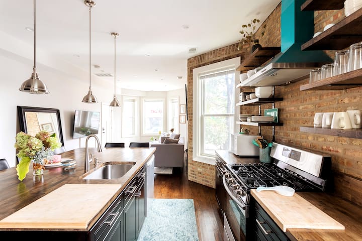 Soft Leather & Warm Bricks in Stylish New Home