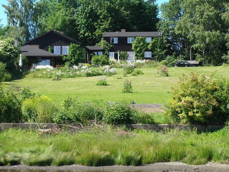 A view of the houses from the kitchen garden. The entire main house to the right is for rent.
