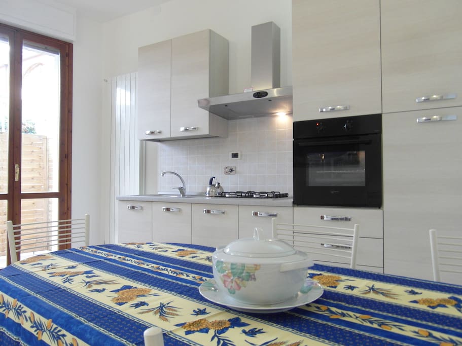 La zona cucina e living room