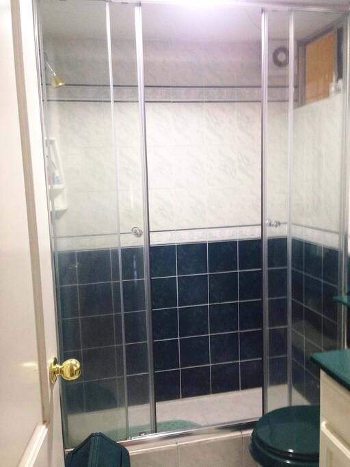 comfortable bathroom, hot shower, with adequate ventilation normal shower bath with hot water spaceBaño