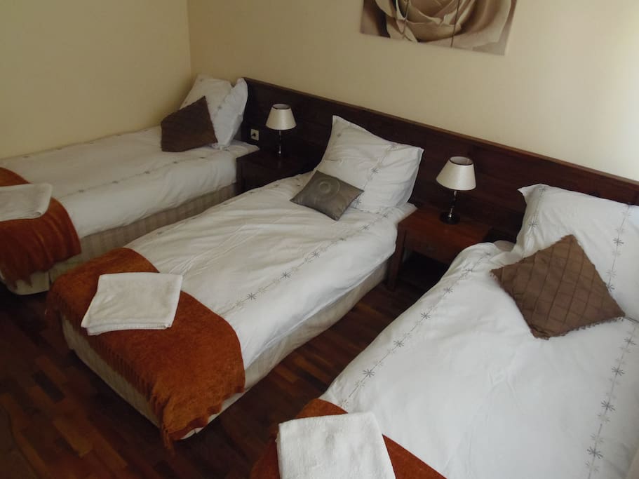 One of our rooms set up for three people in a room with out bunk beds