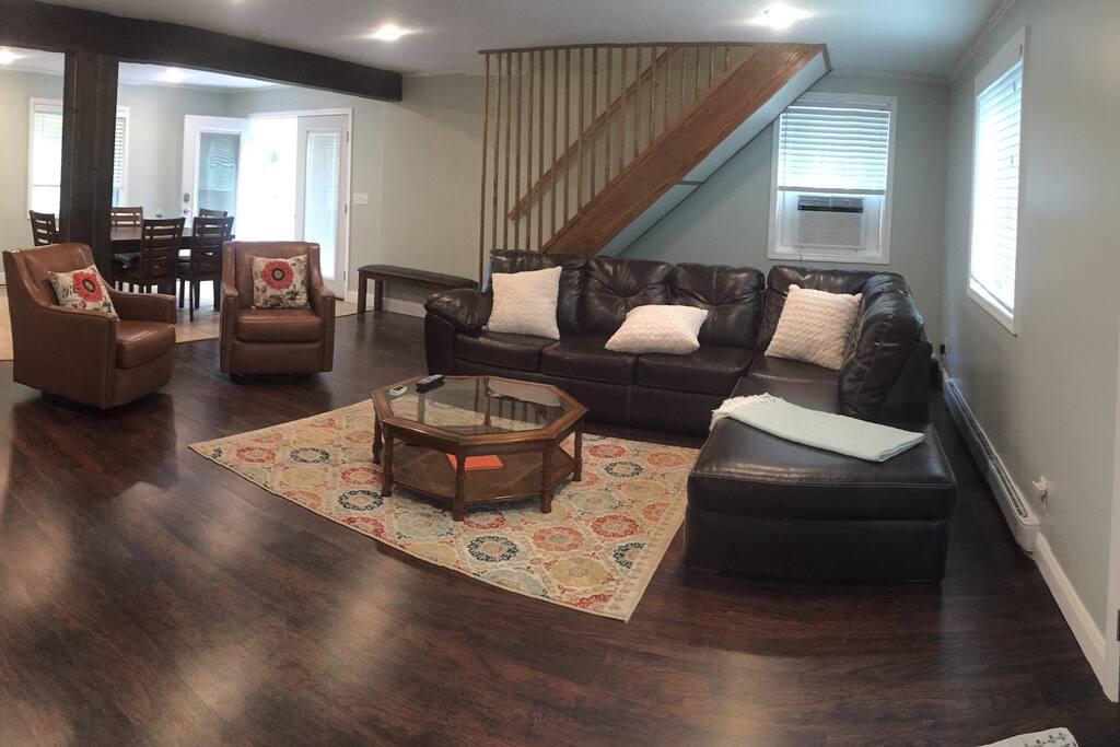 Living room - all leather couch and chairs