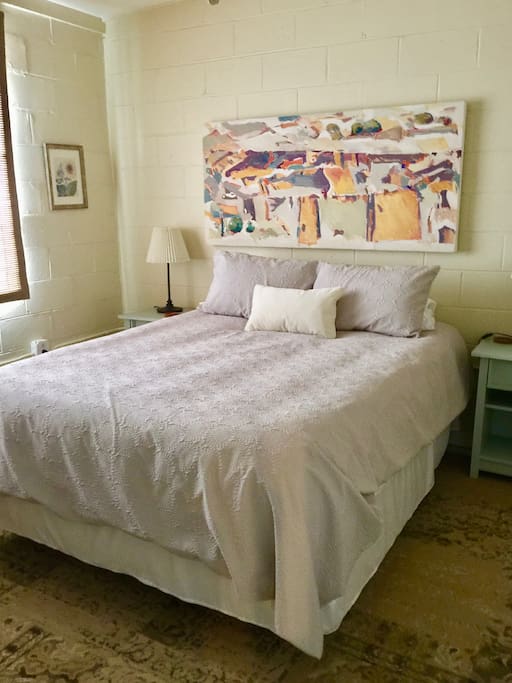 Queen bed in private bedroom.