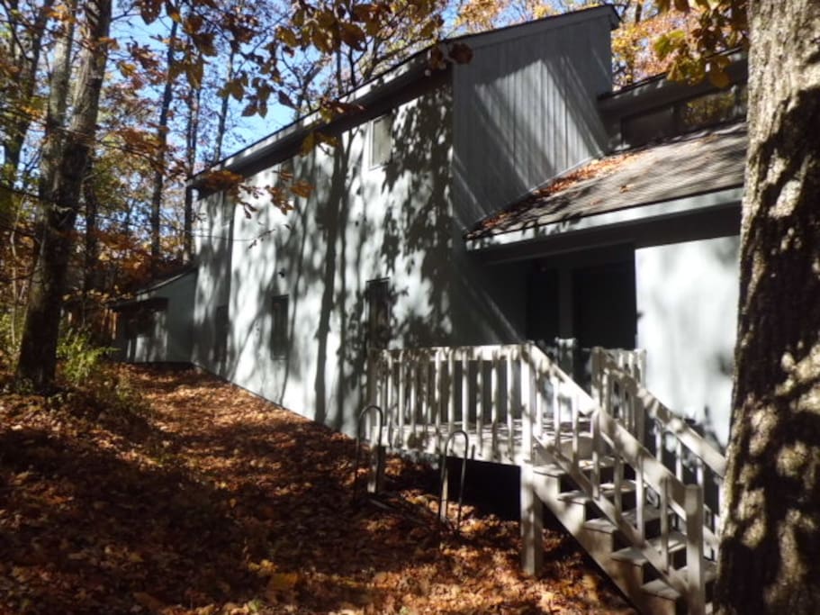 Our back entrance - key pad provides easy access...firewood is stored by back steps