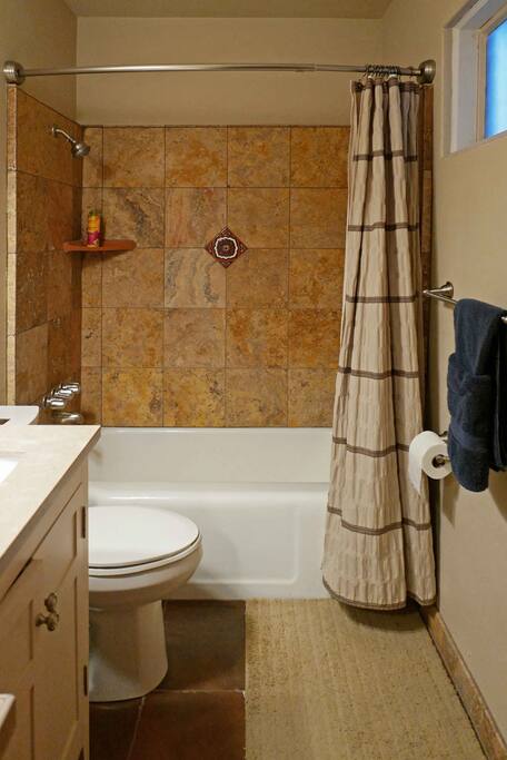 Private bathroom with shower/bathtub combined