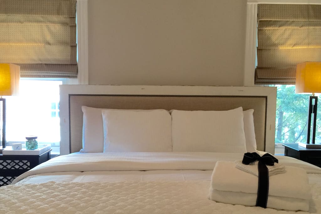Beautiful King Size bed, Plush Sheets and pillows
