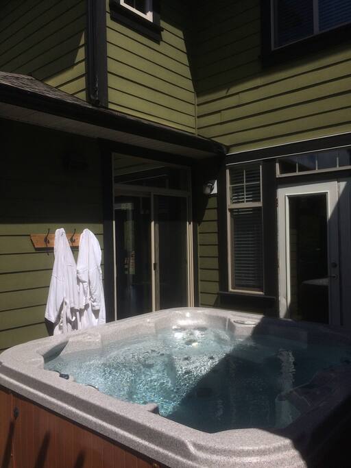 Tucked away hot tub, just one step out the French doors.