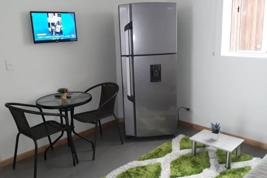 Tv in living room and in the room.