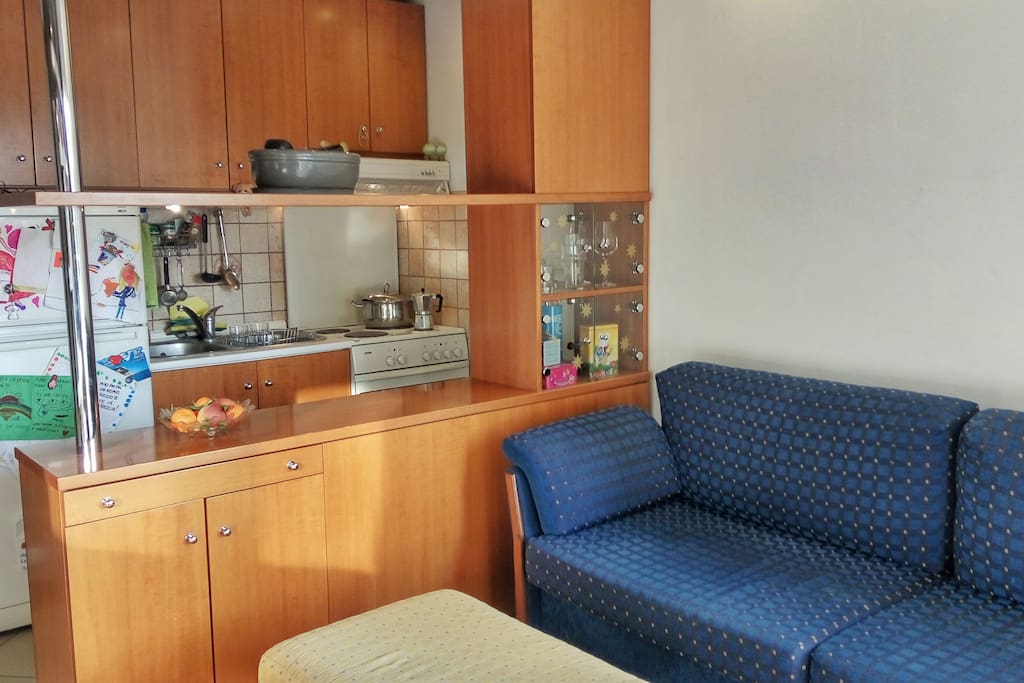 The kitchen is small but has everything you need: Stove (electric), fridge, microwave.