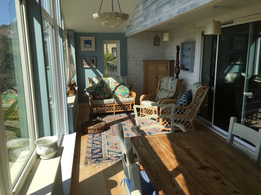 Sunny conservatory with sea views