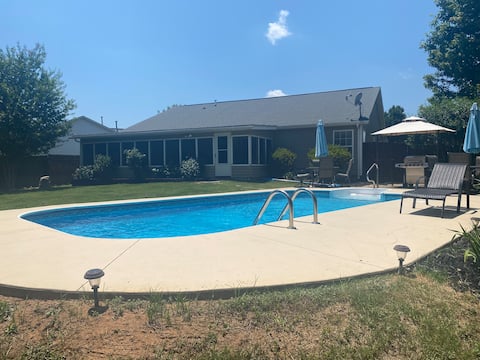 Spacious 3 BR house with private backyard oasis.