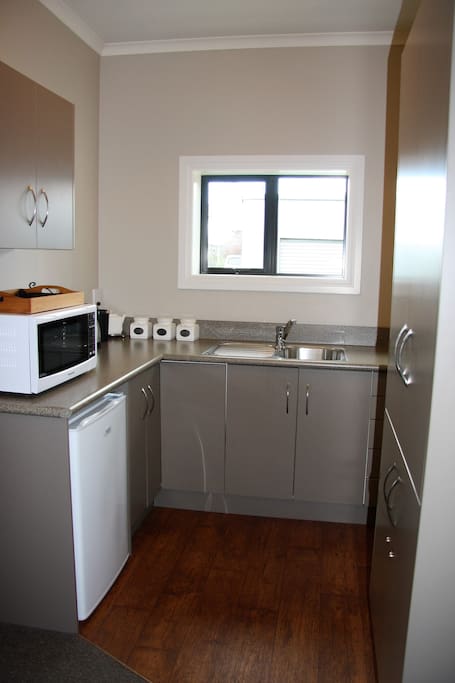 The well appointed kitchenette is very suited to all cooking requirements.