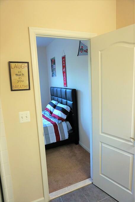 View from private bathroom into Bedroom.