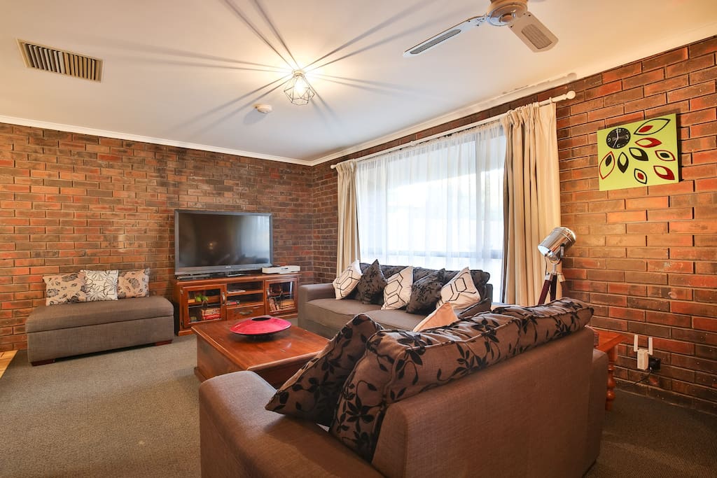 Spacious Lounge with large TV