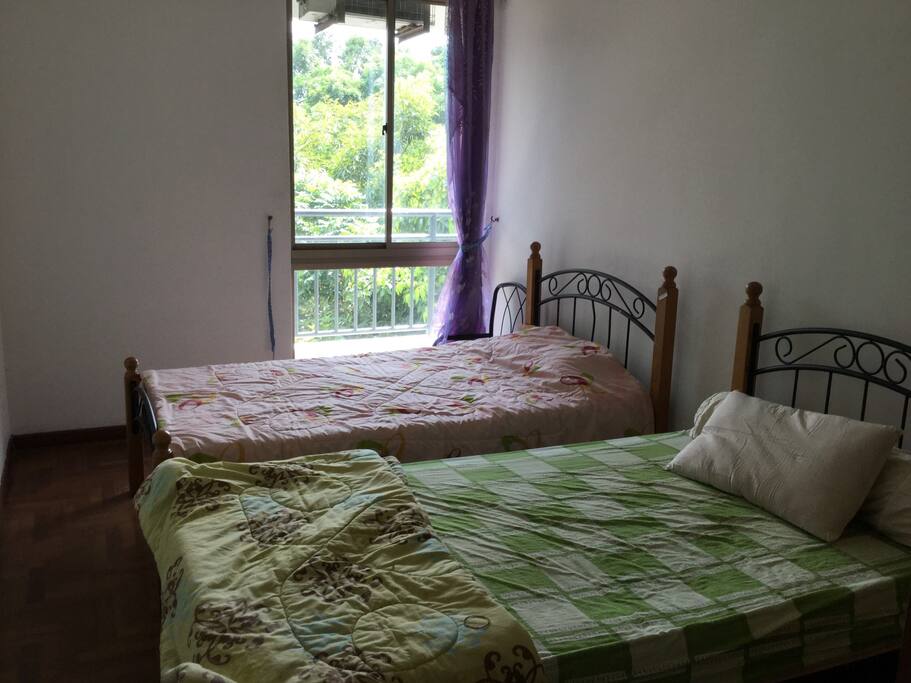 2 super single beds with air con