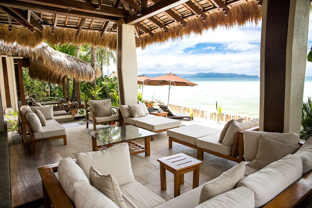 Outdoor living area outside the house for resting and family gathering while enjoying the sea view