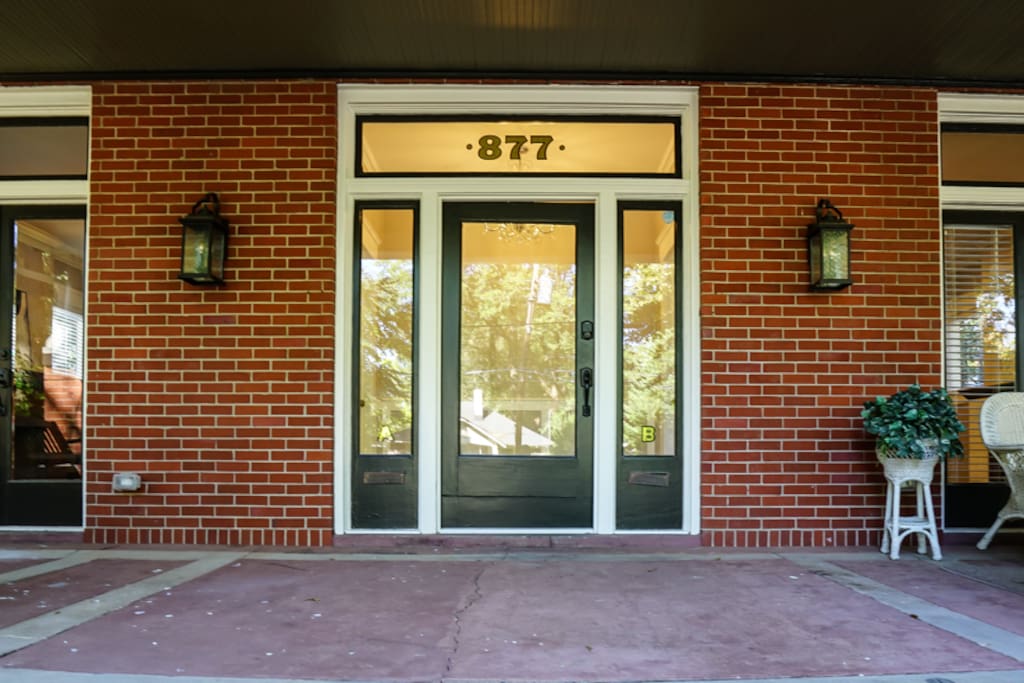 French doors open to porch
