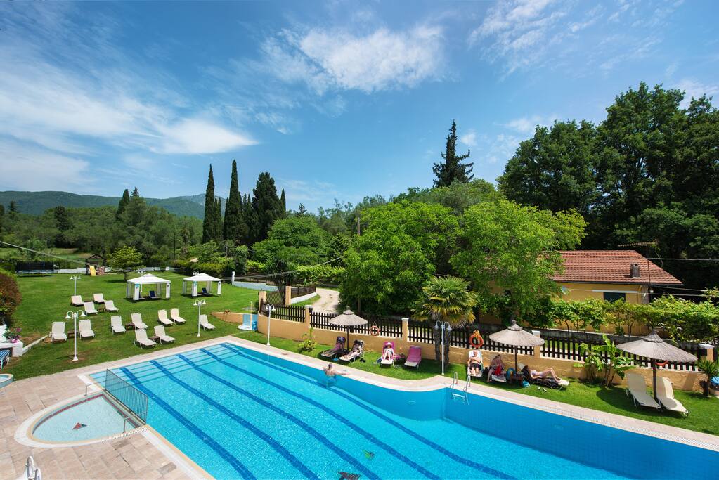 Outdoor Swimming Pool & Garden view