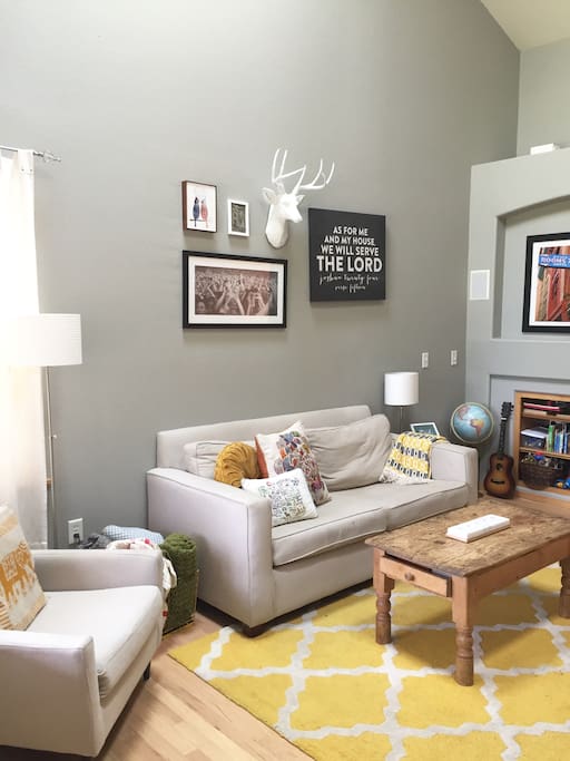 High, vaulted ceilings and grey tones make our living area spacious and calming.