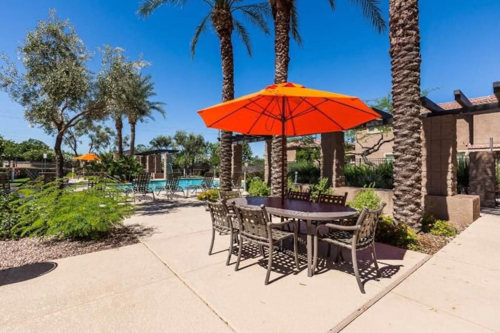 Picnic tables by the pool
