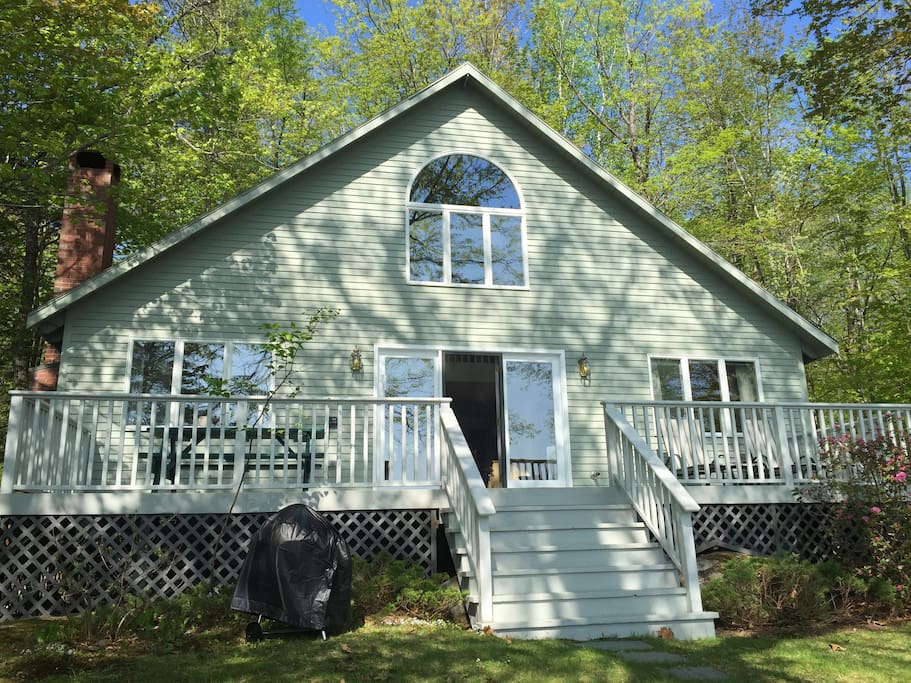 The house looks over Moose Pond with views from less than 50 ft off the water.