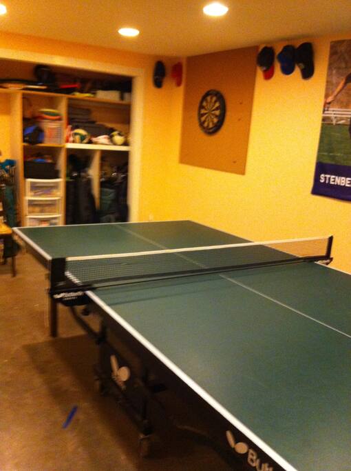 Play table tennis and darts in the shared rec room.