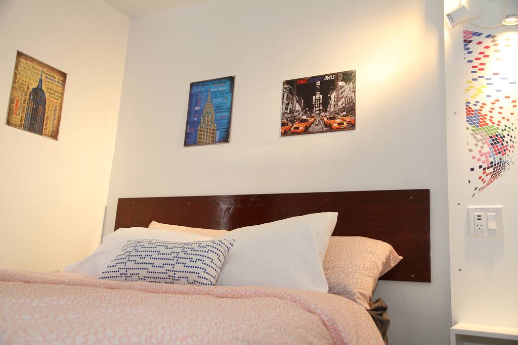 Bed side counter with USB, power outlets, and reading light.