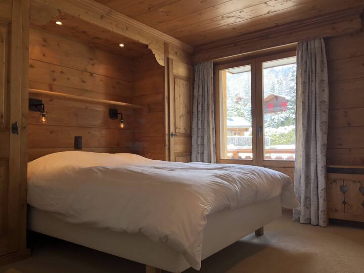 Master bedroom with access to back balcony (north-east)