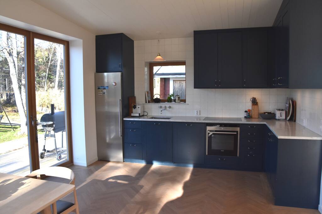 kitchen with connecting with the outdoor place and grill