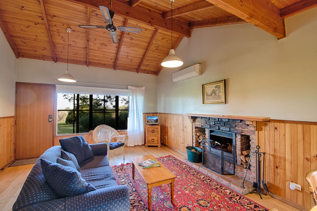 Murray's large living area with open fire.