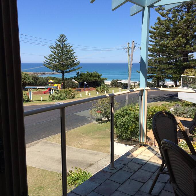 Sitting on the balcony looking at the big open space in front