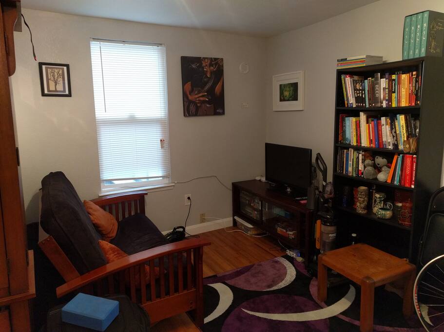 Living room. Comfy couch lots to read