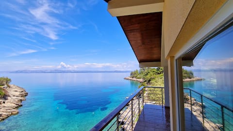 Remote beach house, just above the sea.