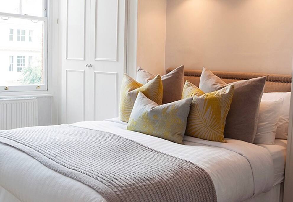 Warm bedroom with private bathroom and toilet