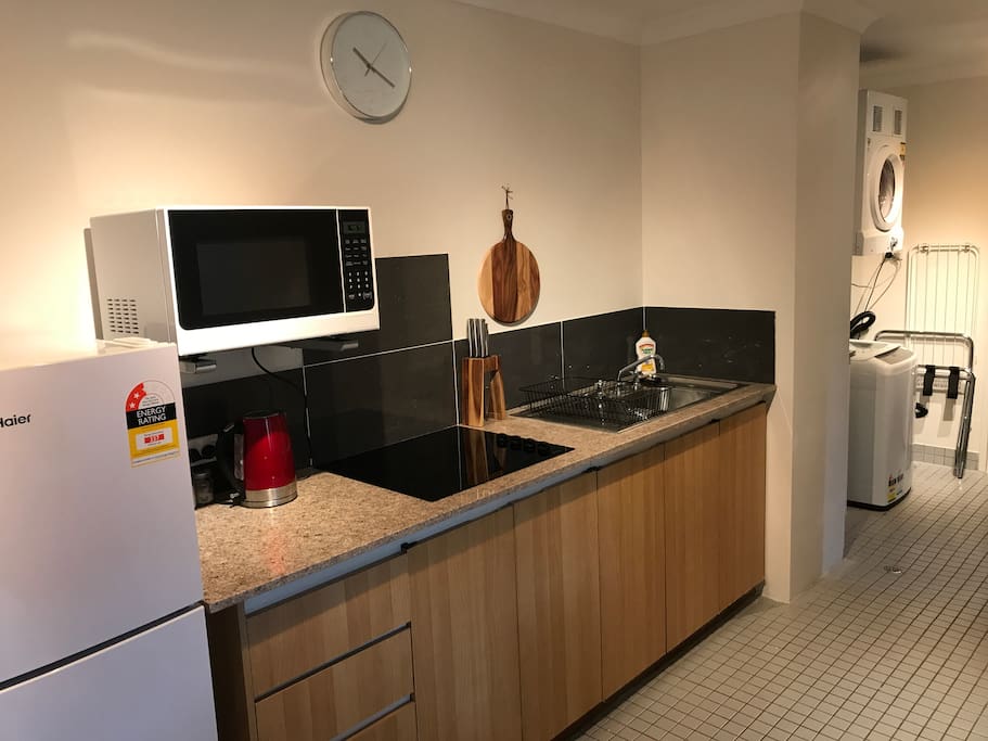 Newly renovated kitchen with new granite bench, cooktop and all cooking essentials and utensils