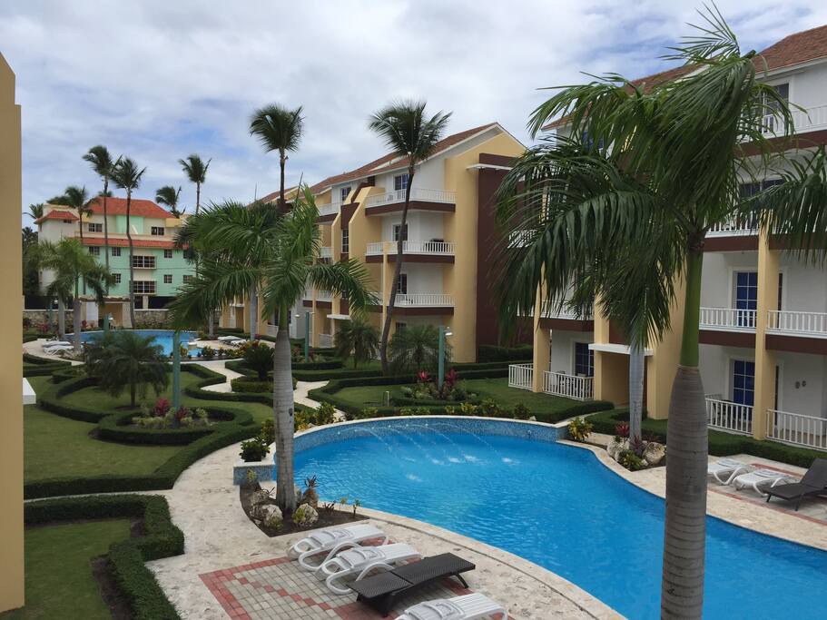 View of pools and beautiful gardens from your own private lanai
