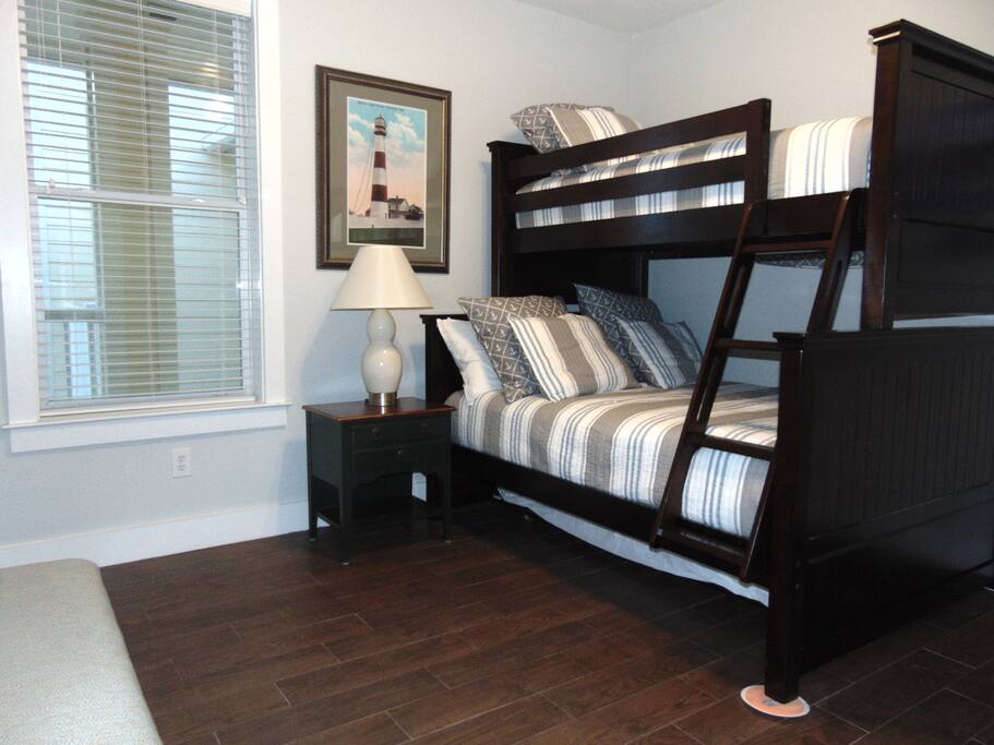 Bedroom 3 sleeps 4 guests with twin over double over twin trundle bed