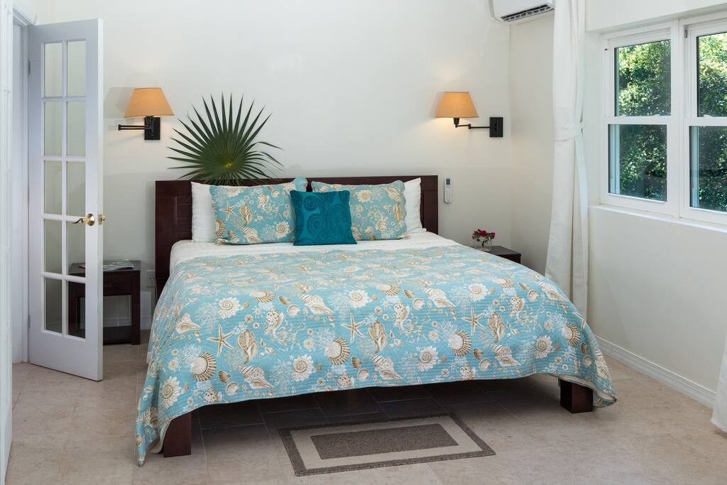 King Bed and views into the lush garden