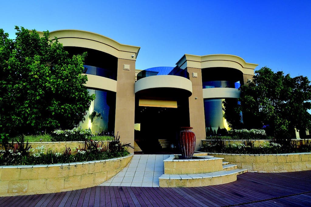 Canalview of this beautiful home with it's magnificant curved windows and balconies