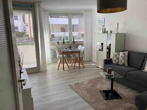 Close to the beach apartment balcony, parking space & wifi
