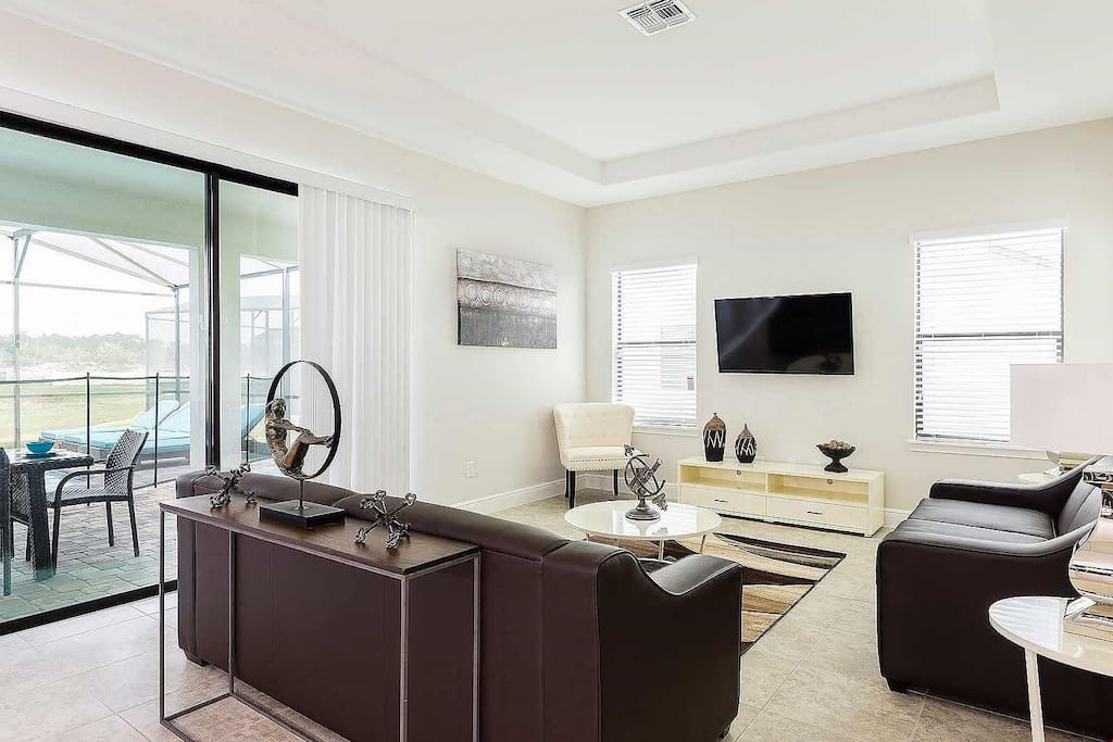 Sit back and enjoy watching a movie on the flat screen TV in the living area.