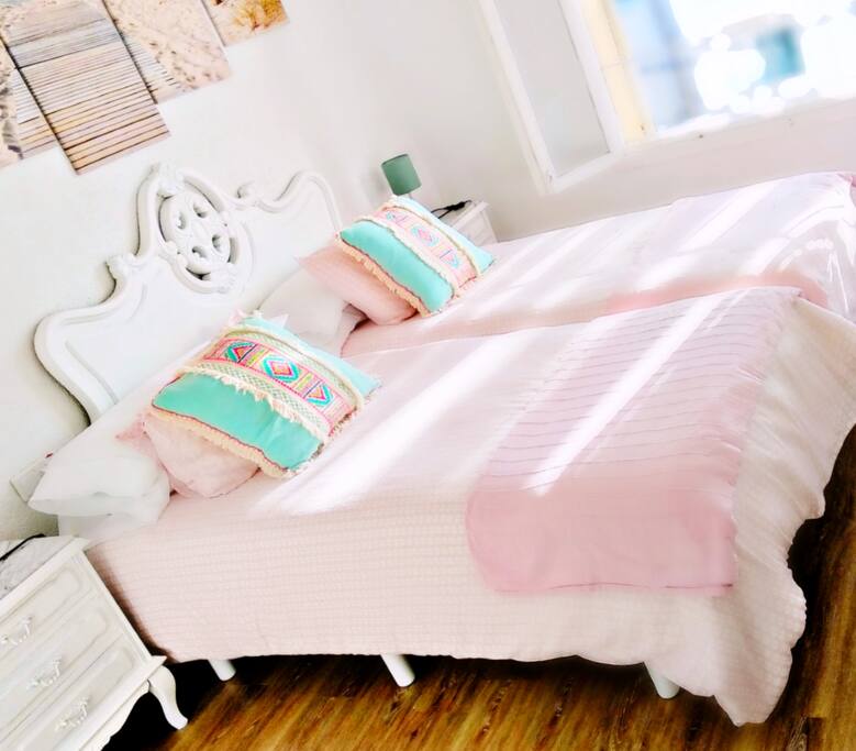 Sunny Main bedroom with sea views. One king size bed or 2 singles beds