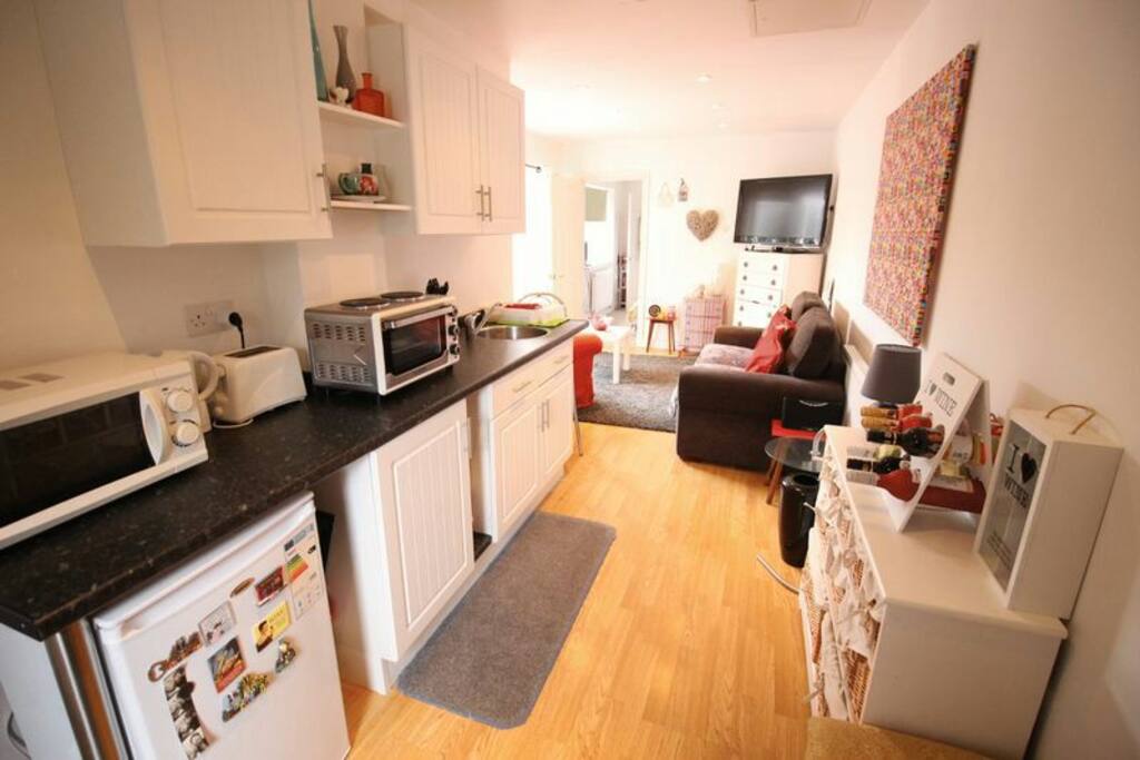Lounge/ kitchen with pull out small double sofa bed