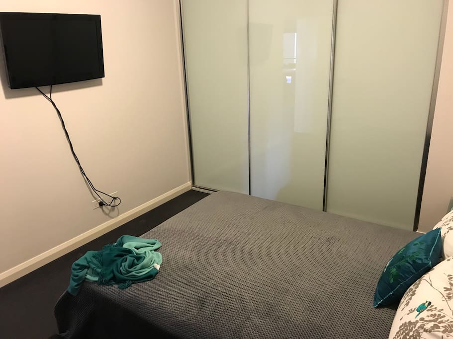 TV and large wardrobe