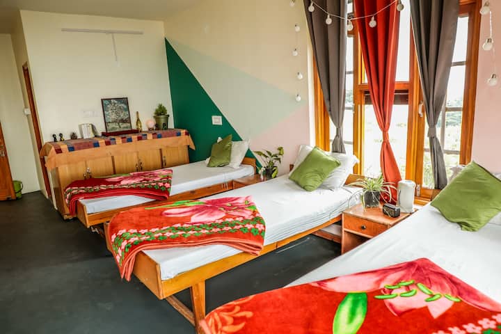 There are 3 beds in the room which can be arranged as three single beds or a double bed plus a single bed as per your convenience.